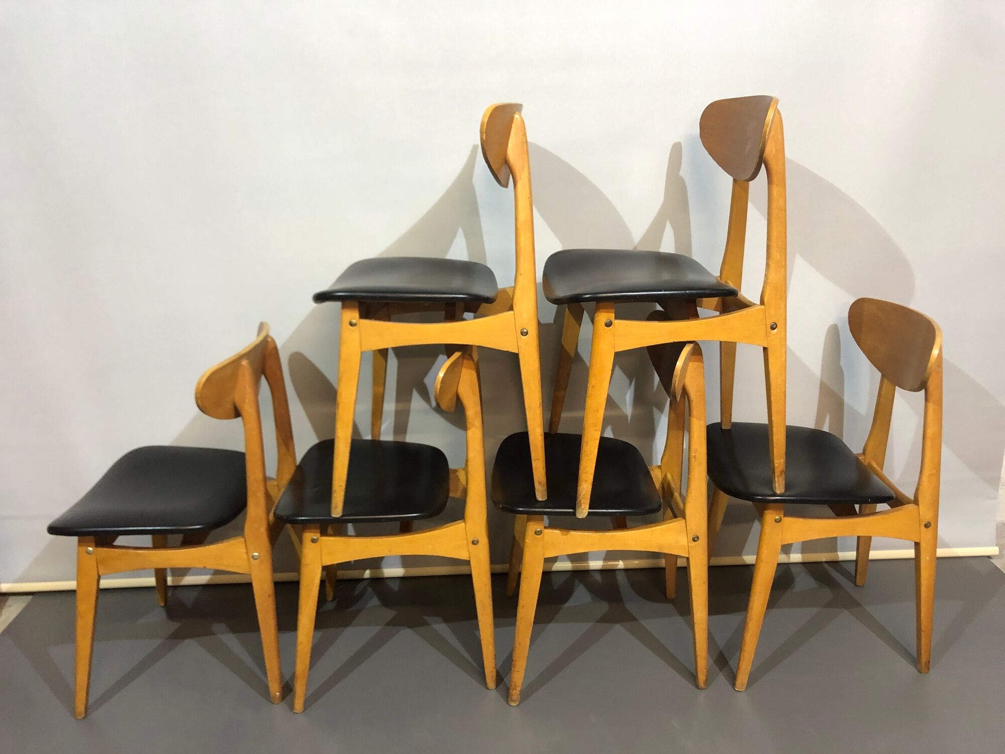 12 stella 1950 chairs in signed curved wood