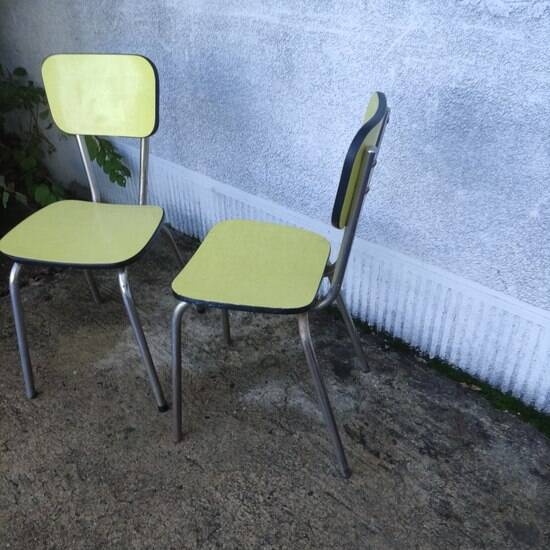 Pair of yellow formica chairs