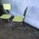 Pair of yellow formica chairs