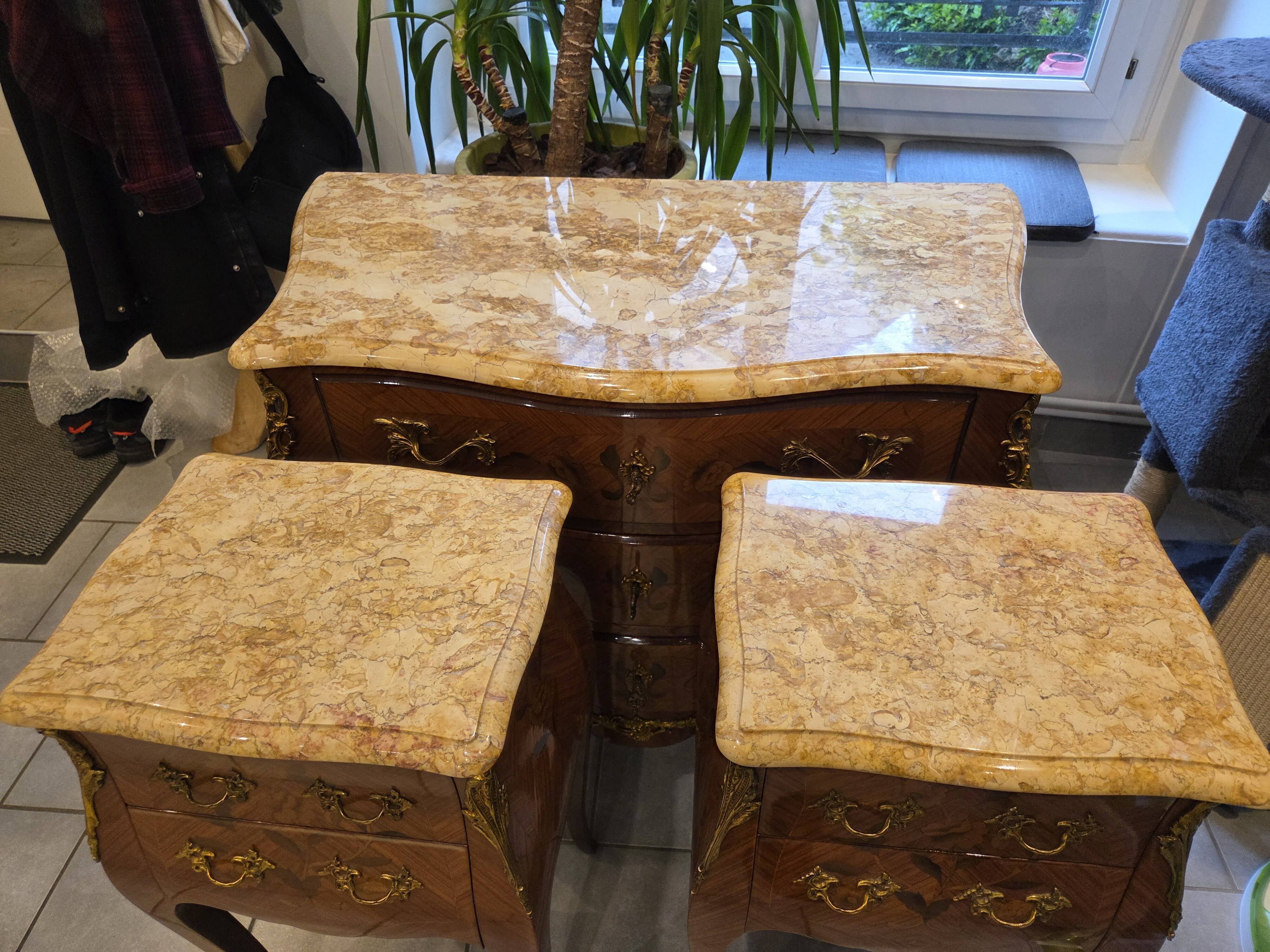 Louis XV style commode with marquetry and marble.