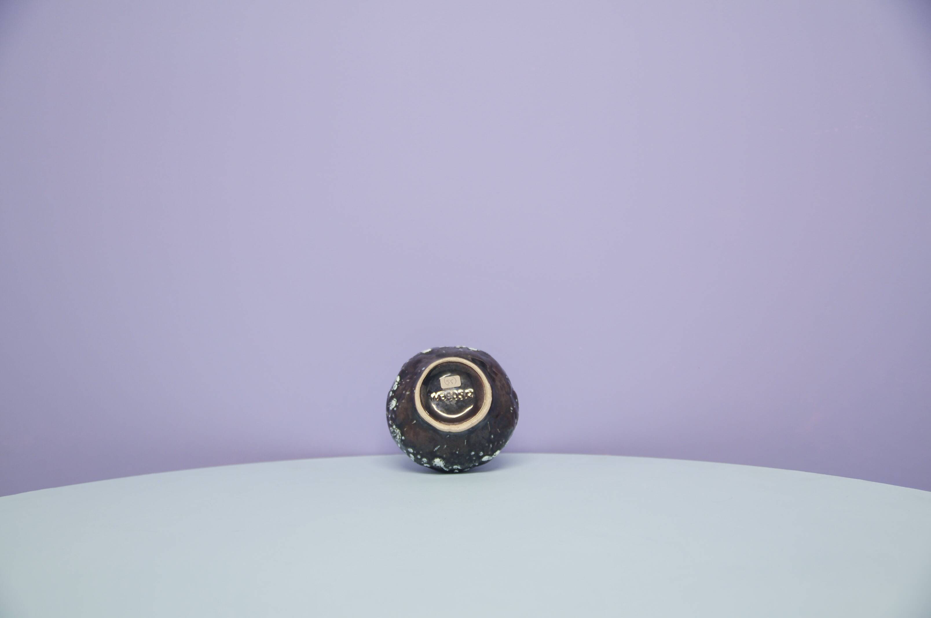 A vintage purple & bronze sheen Fatlava Walter Becht can vase