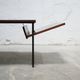 Modernist coffee table in wood and metal