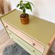 1960s commode with tapered legs.