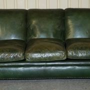 Victorian leather canapé, shield armrests, stamped Maple & Co.
