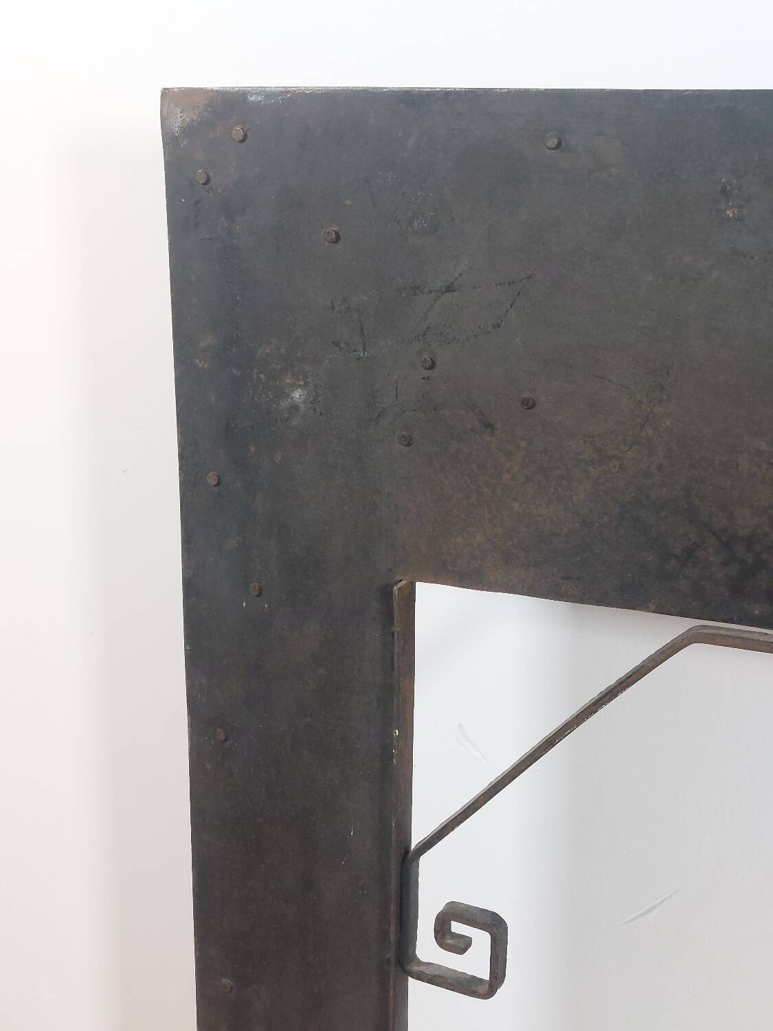 Hand-forged spiral decorative fire surround.