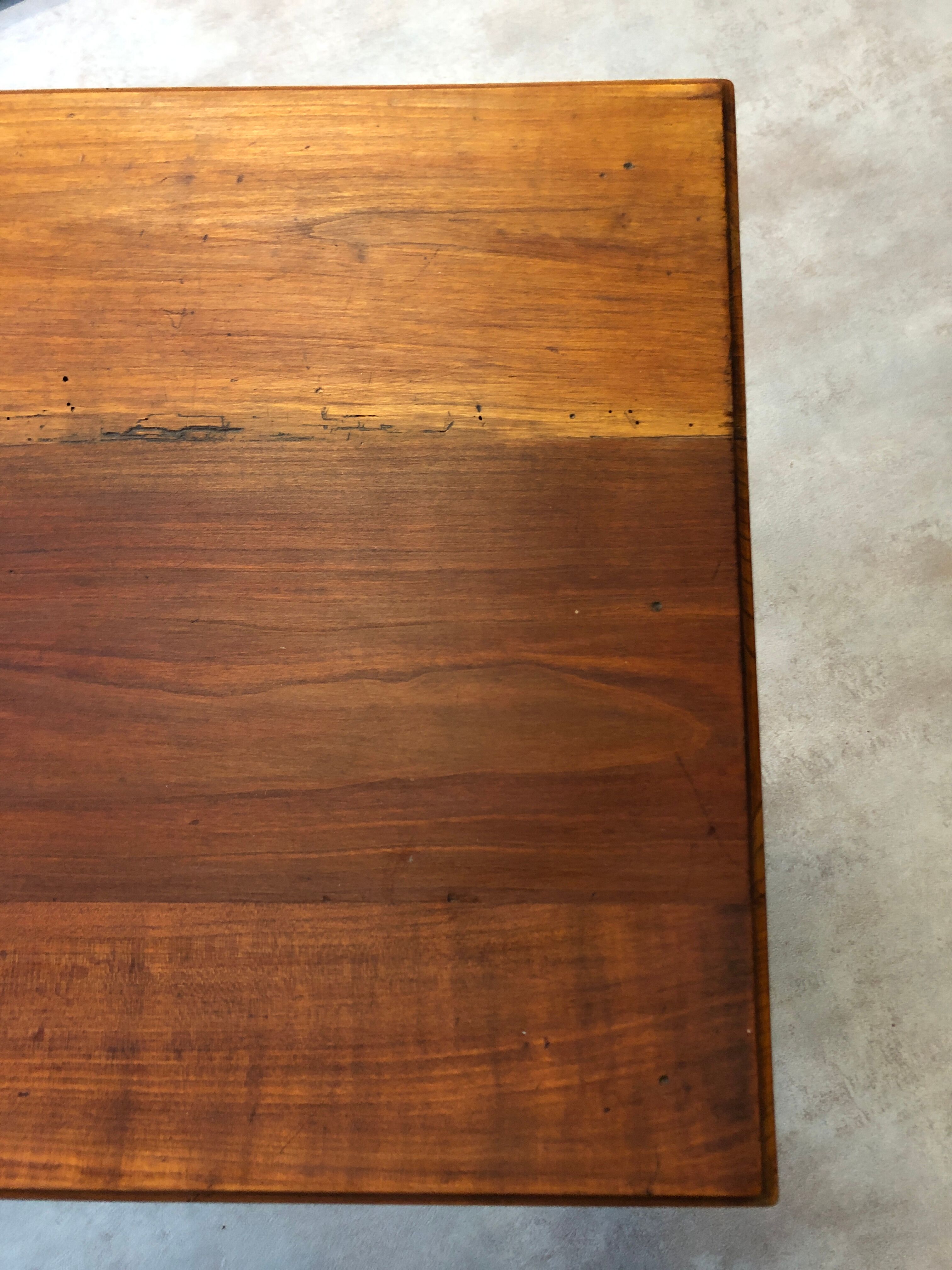 Walnut wood desk with a drawer