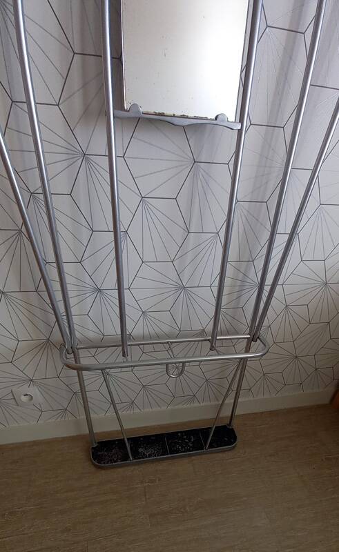 Vintage aluminum wall coat rack.