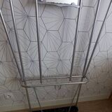 Vintage aluminum wall coat rack.