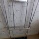 Vintage aluminum wall coat rack.