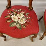 Pair of Louis Philippe walnut chairs, petit point tapestry