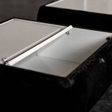 Set of 2 side tables with integrated lamp.