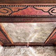 Antique mirror designed by "Pierre Lottier". Leather and nails. France 1