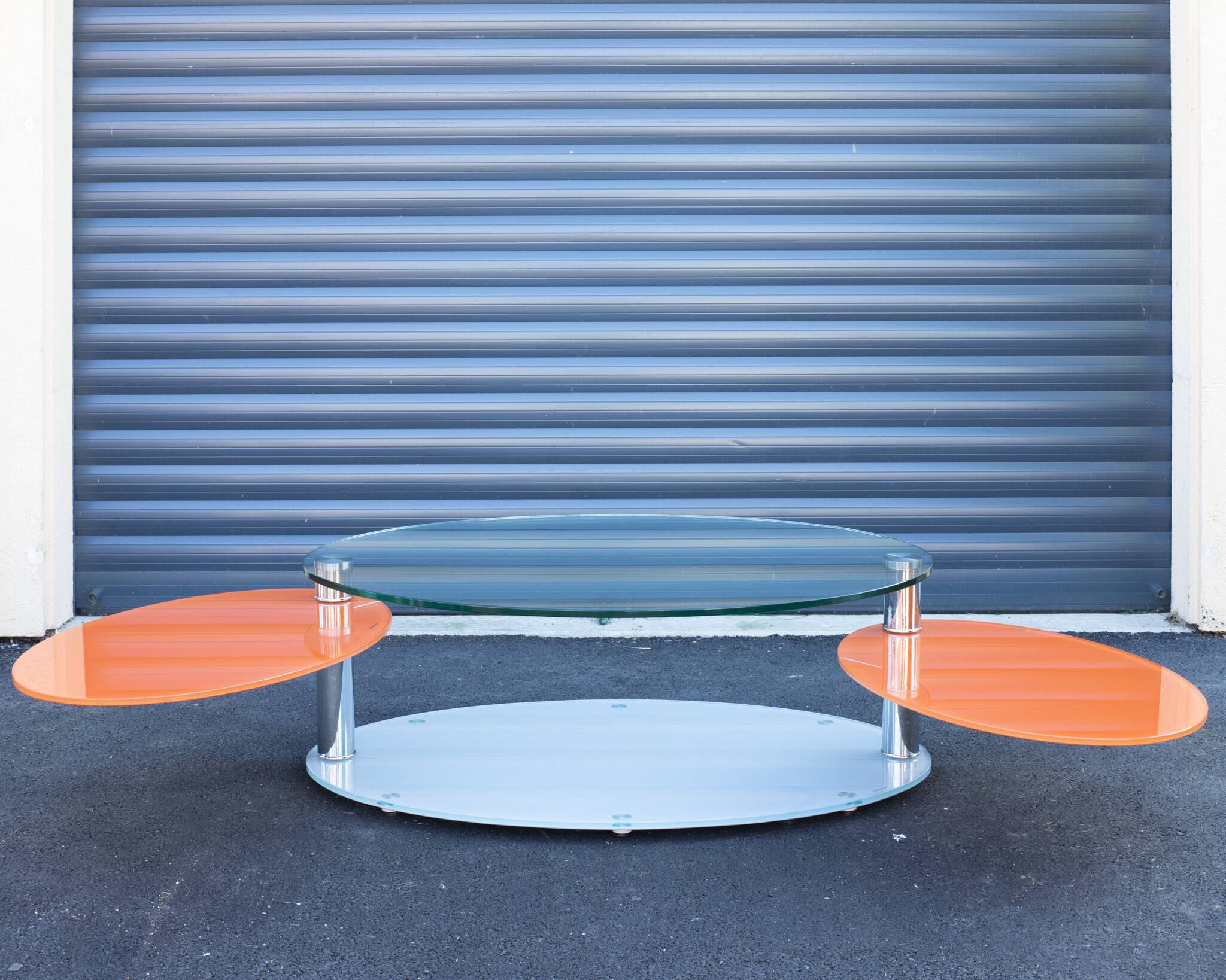 Antoine Motard designer swivel tempered glass coffee table