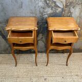 Pair of bedside tables with crossbow base