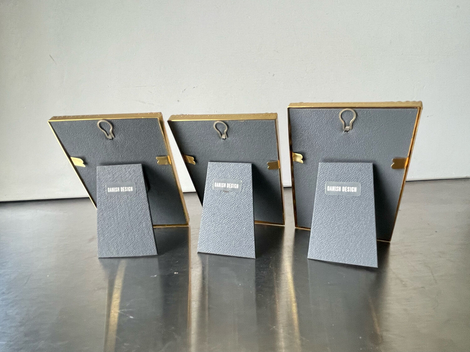 Set of 3 vintage identical gold colored metal picture frames convex glass