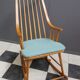 Mid century wooden rocking chair with blue upholstery  1960s