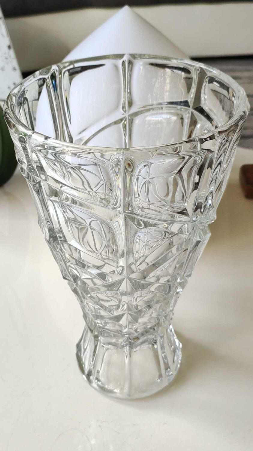 Vintage design vase in crystal. faceted patterns, braces. flared neck