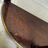 Louis XVI demi-moon console in wood and brass.