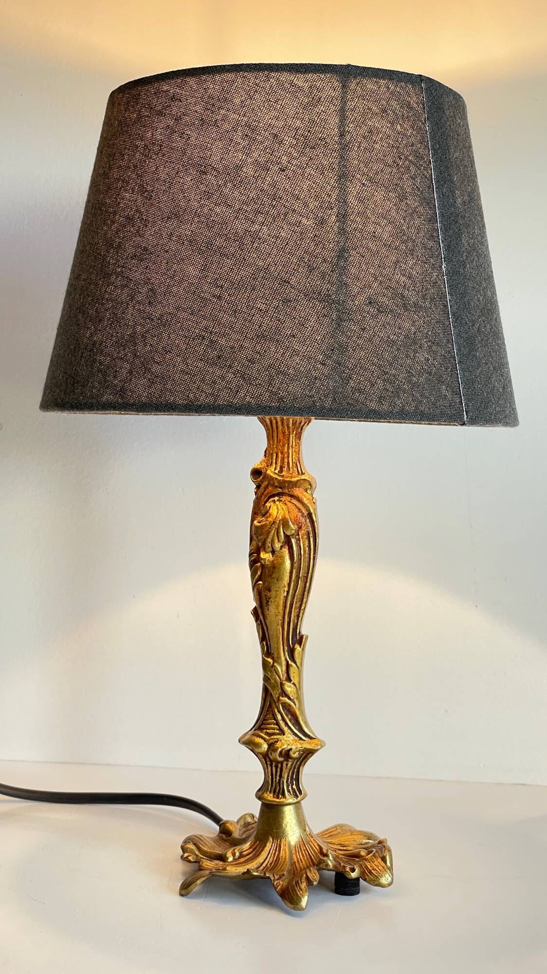 Chic bronze lamp with vintage gold patina