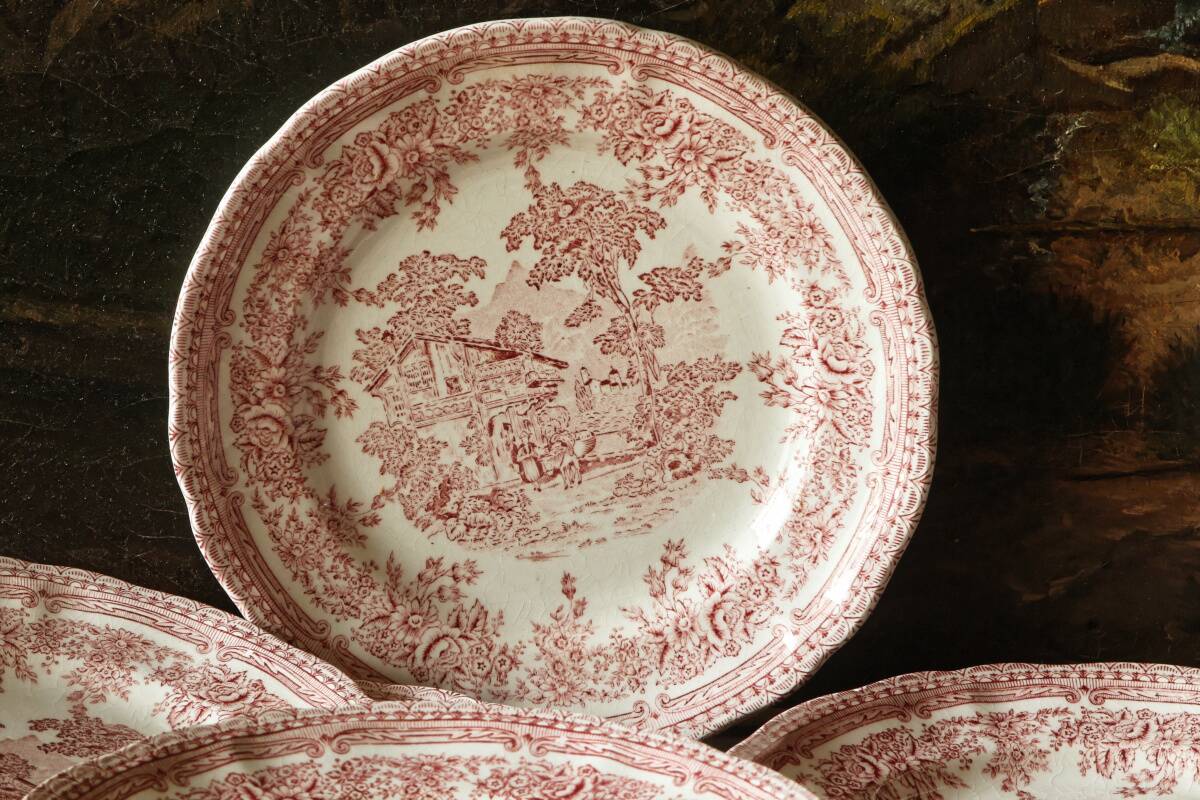 Set of 11 dessert plates in English earthenware.