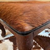 Vintage wooden and goatskin pouf