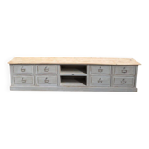 Old workshop furniture transformed into a TV unit.