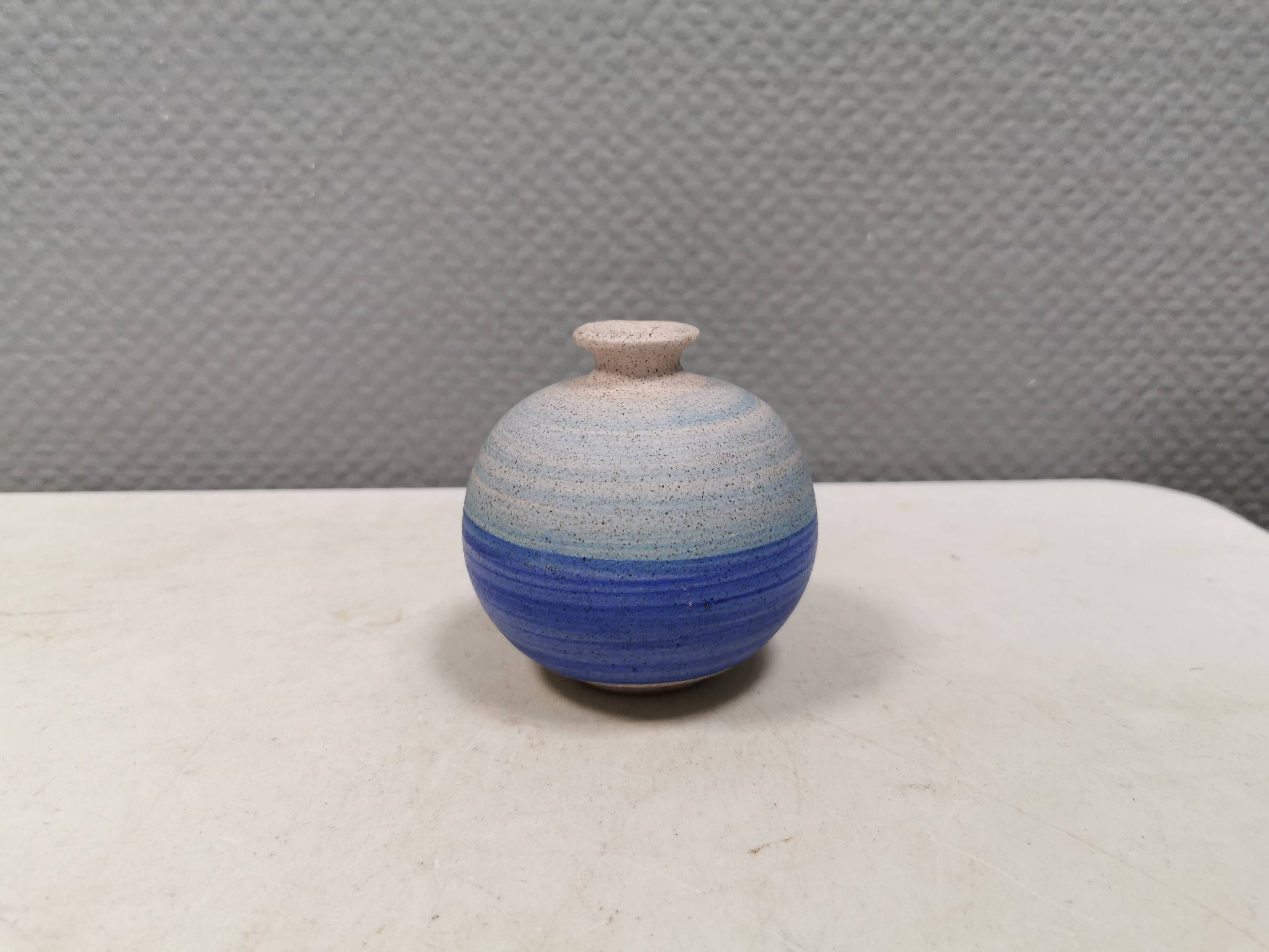 A small, round, beautiful ceramic vase from Denmark, dating from the 1980s.