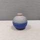A small, round, beautiful ceramic vase from Denmark, dating from the 1980s.
