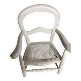 Low wooden children's chair with canework