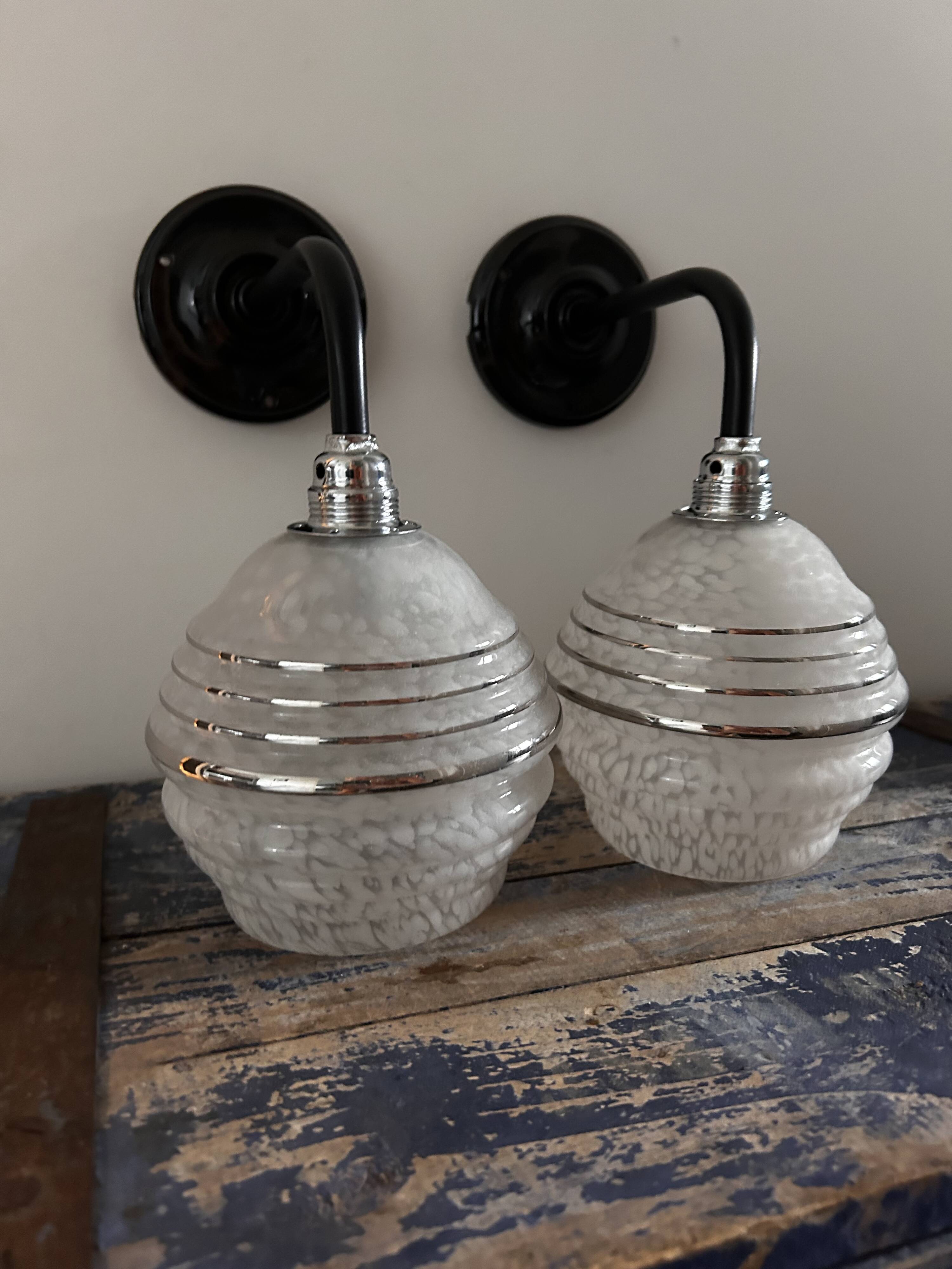 Pair of white, black and silver Art Deco wall lights