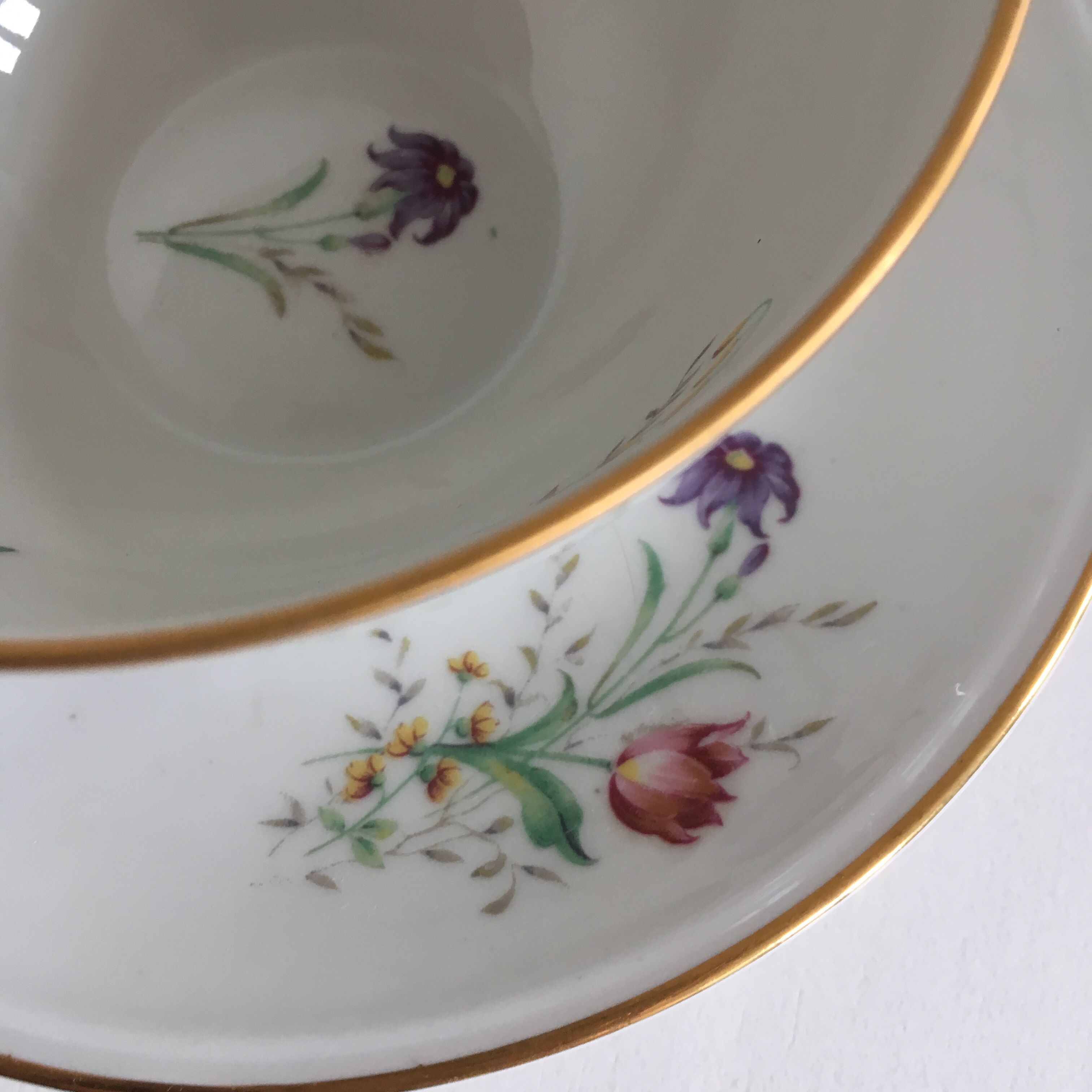 Duo of white Limoges porcelain cups with flowers