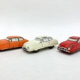 3 old small tin circuit cars with lead wheels • Vintage • 1960s