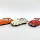 3 old small tin circuit cars with lead wheels • Vintage • 1960s