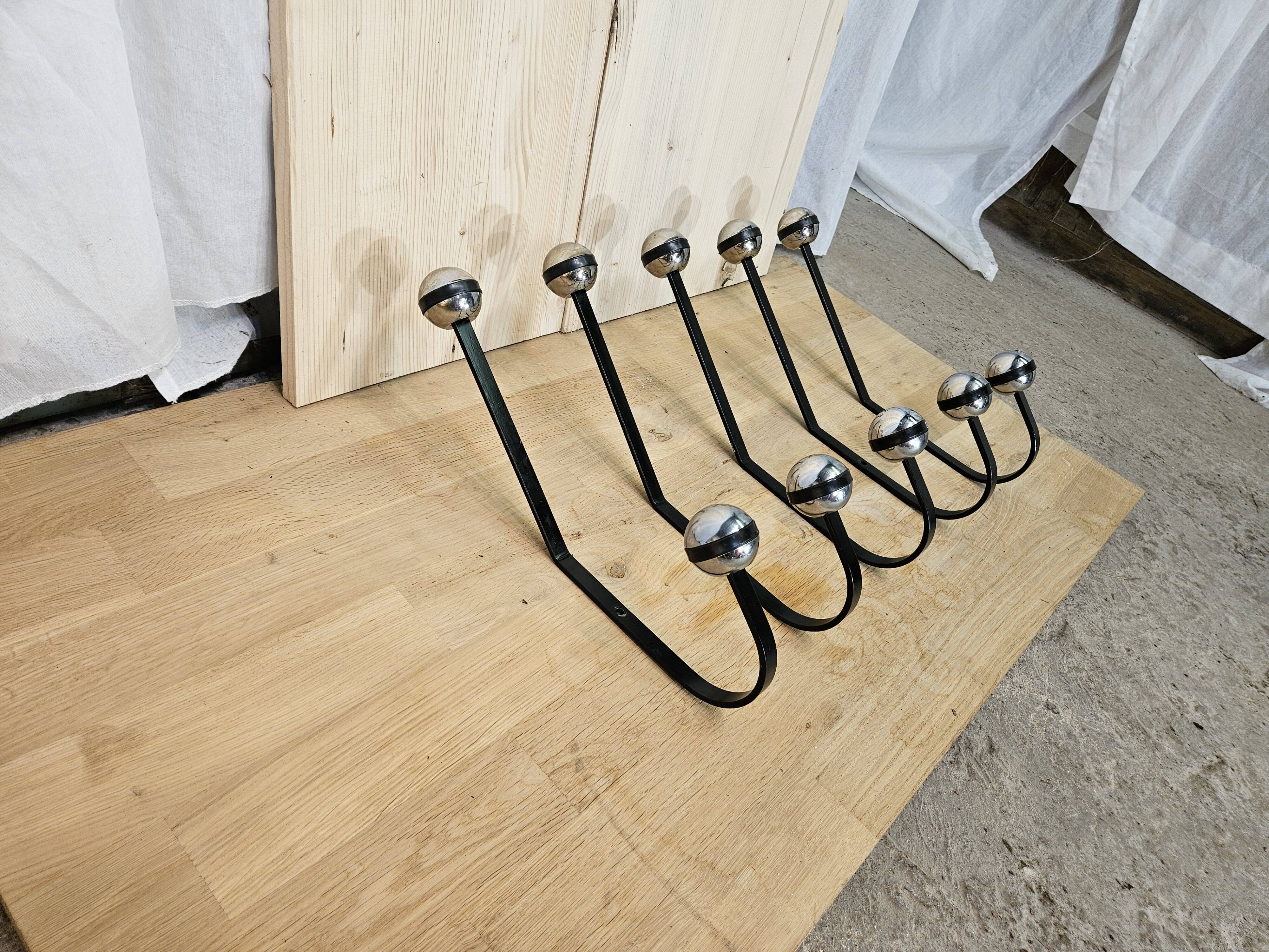 5 black and silver coat hooks from the 60s