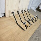 5 black and silver coat hooks from the 60s