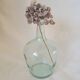 Demijohn in vintage transparent glass