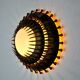 Midcentury brutalist sun wall lamp, metal and gold leaf, Italy