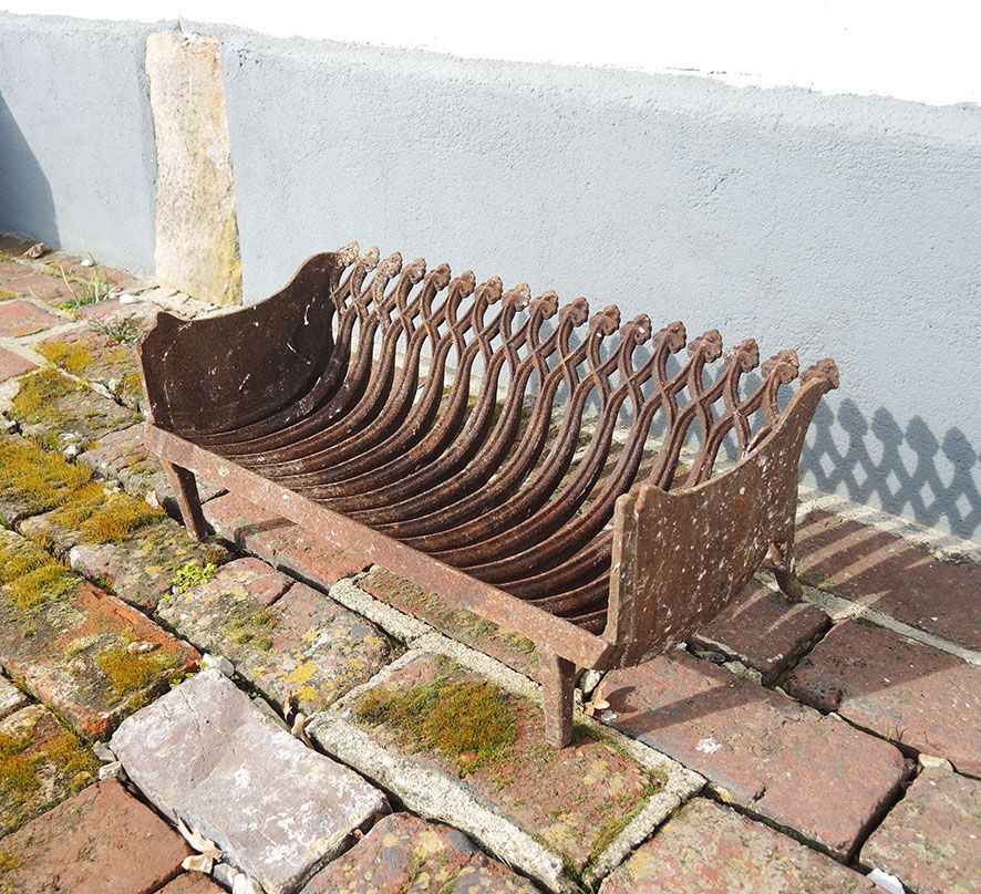 Old gate cradle with cast iron logs