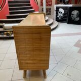 Rattan sideboard with ceramics