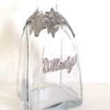 Whisky decanter decorated in tin