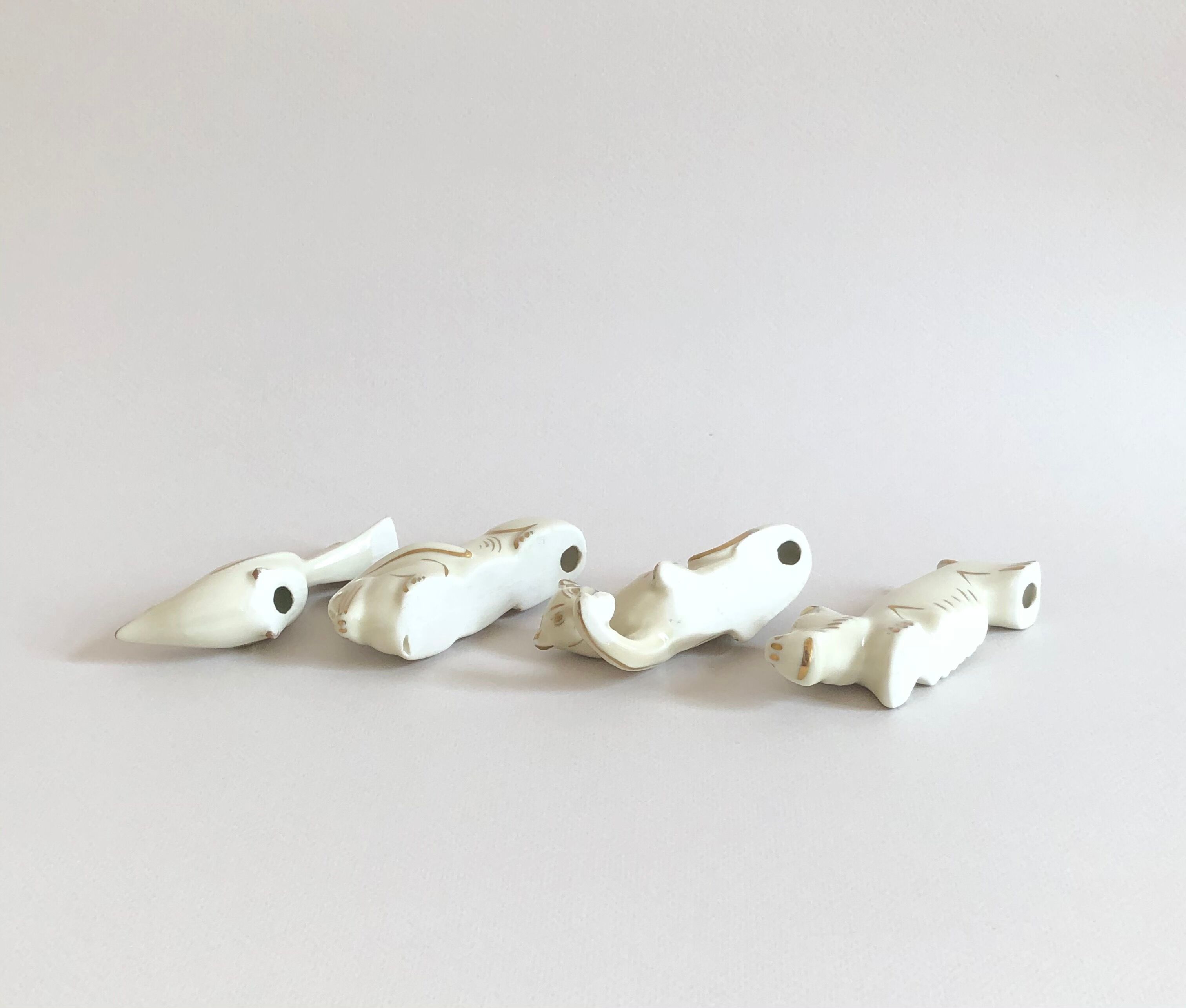Set of 8 art deco ceramic animal knife holders