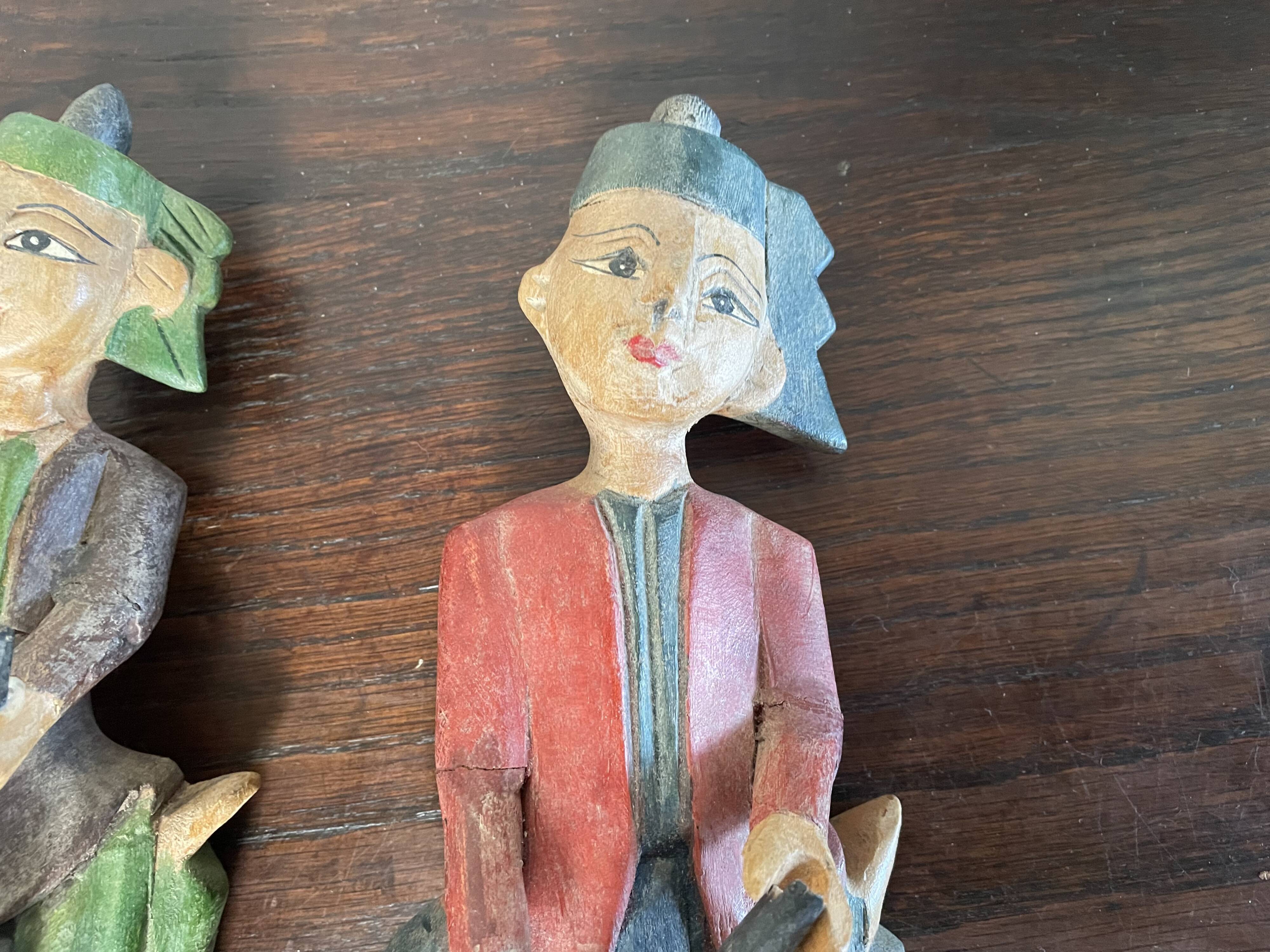 Polychrome wooden statuettes musicians from Asia