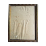 Old frame in worked/golden wood