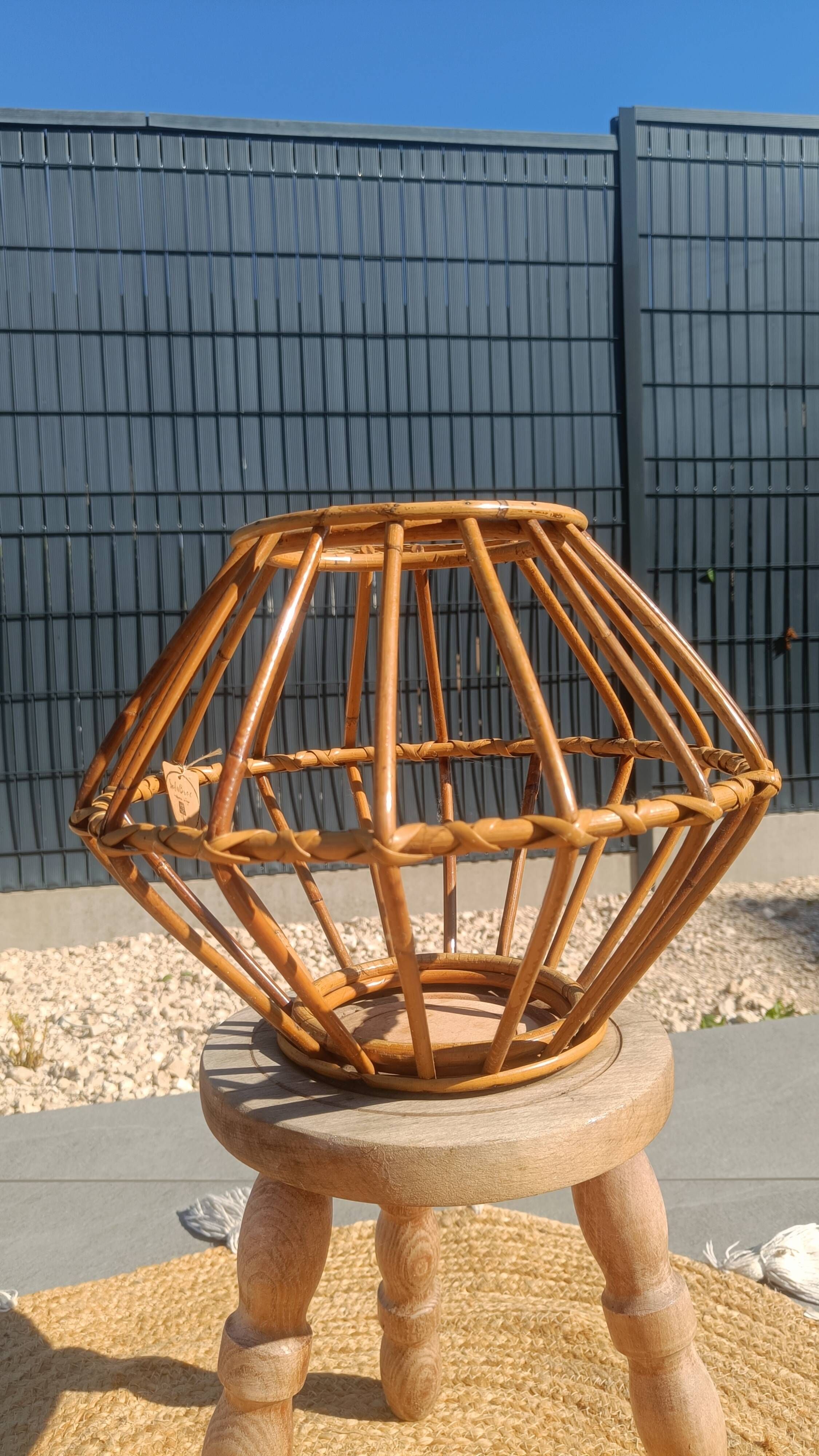 Vintage rattan and bamboo pendant light with removable shade.