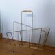 Gold metal magazine rack