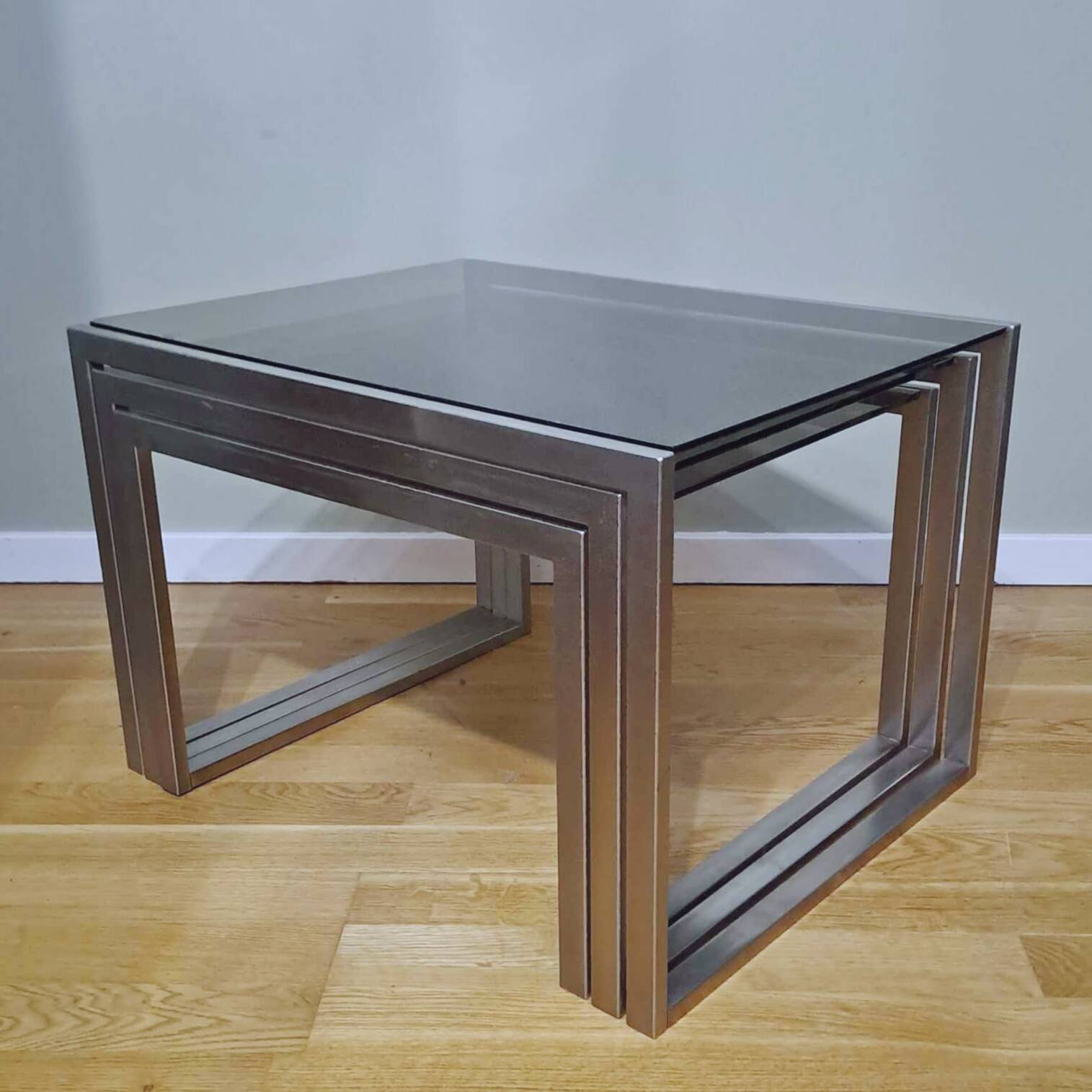 Chrome and smoked glass designer nesting table