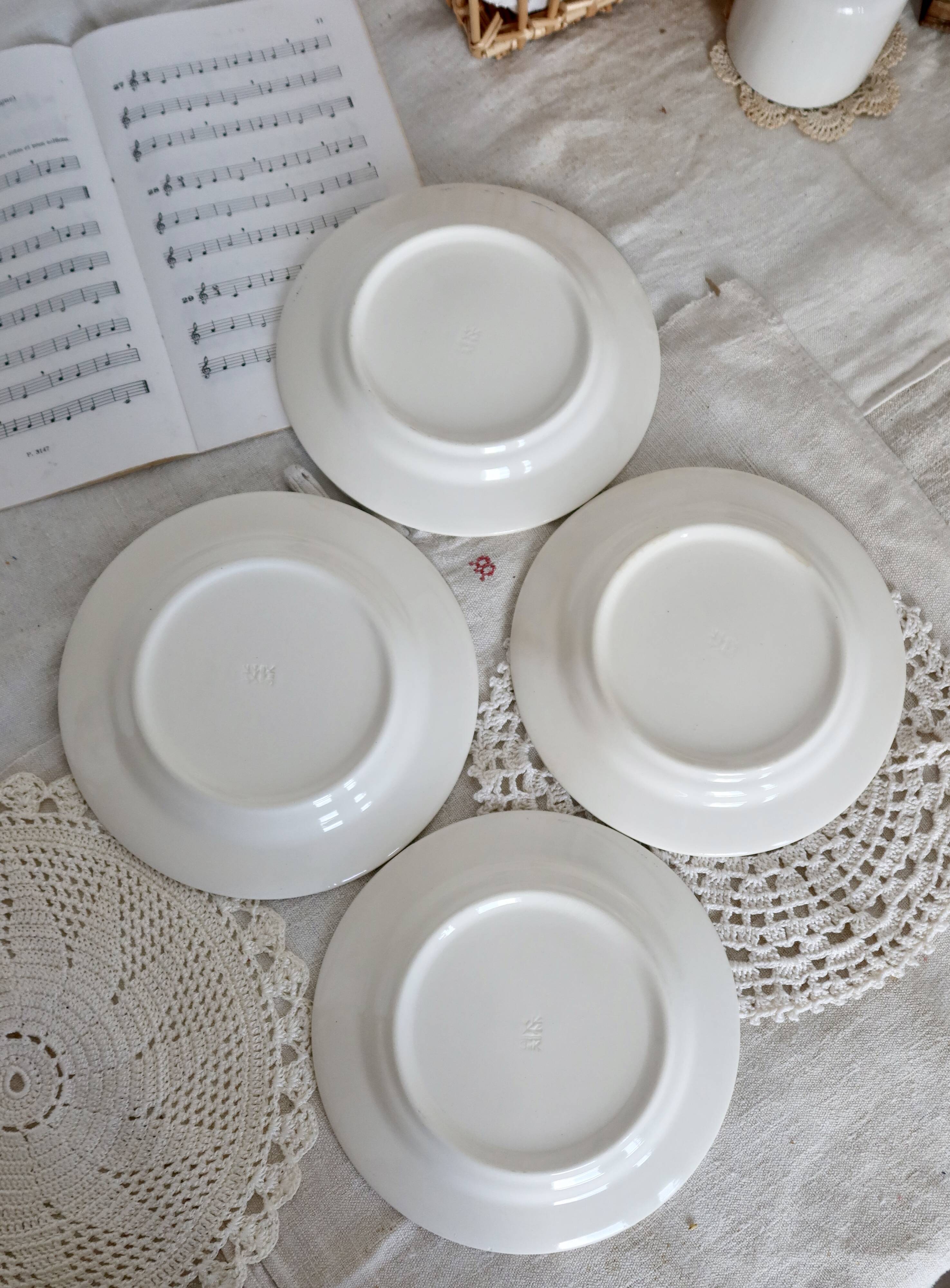 4 vintage porcelain dessert plates with blue border