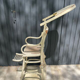 Vintage baby high chair from the late 19th and early 20th centuries