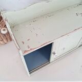 Small old wall shelf with sliding doors
