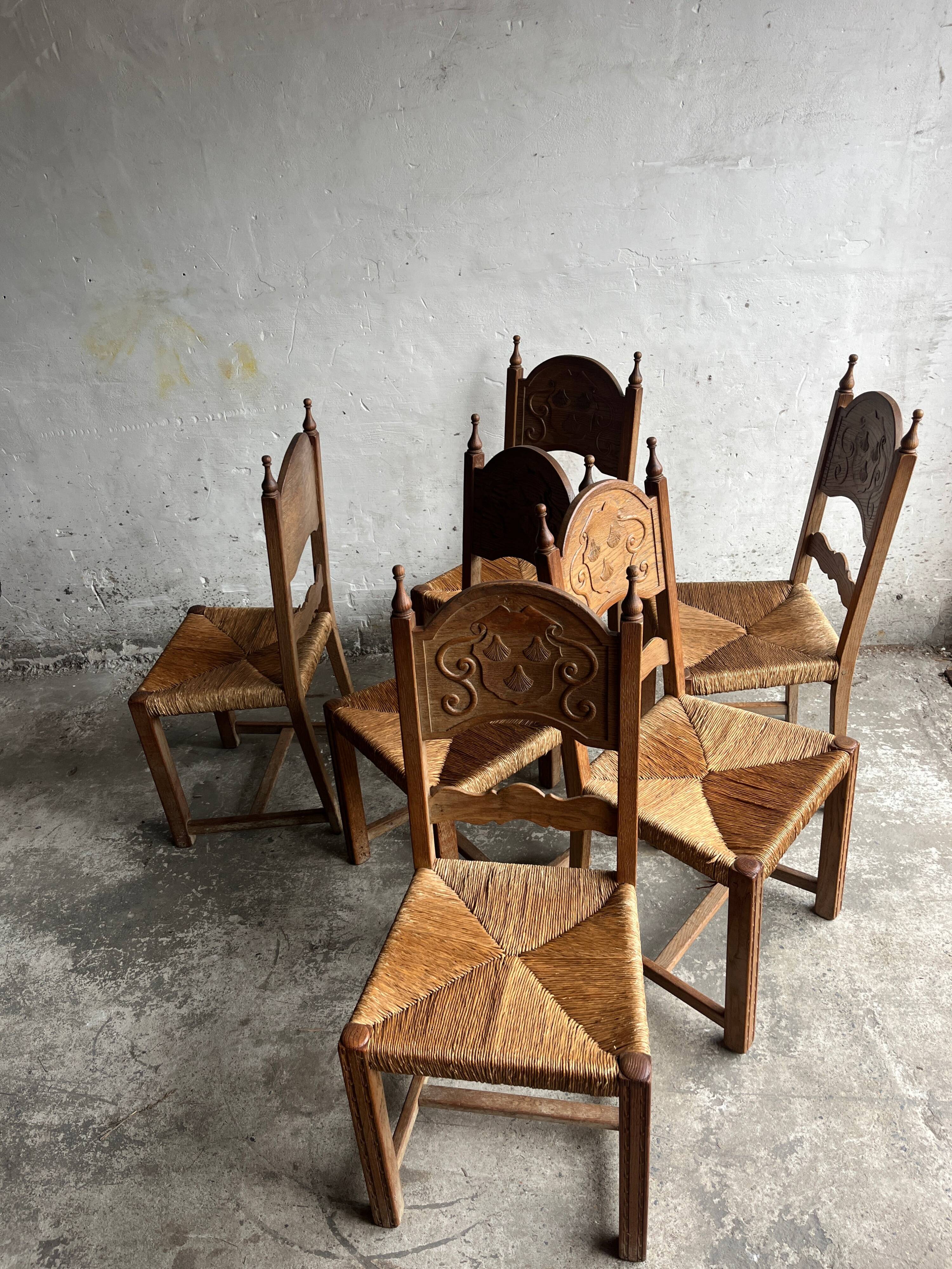 Set of 6 sculpted oak chairs with straw seats – 1950s